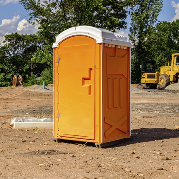 how often are the porta potties cleaned and serviced during a rental period in Violet